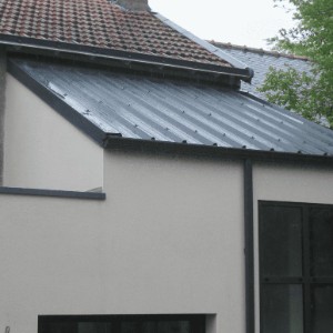 Rénovation d'un toit en bac acier isolé et pose de gouttière
